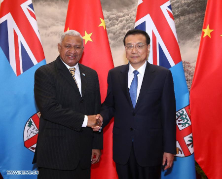Chinese Premier Li Keqiang (R) shakes hands with Fijian Prime Minister Voreqe Bainimarama at the Great Hall of the People in Beijing, China, July 16, 2015. (Photo: Xinhua/Pang Xinglei) Chinese Premier Li Keqiang (R) shakes hands with Fijian Prime Minister Voreqe Bainimarama at the Great Hall of the People in Beijing, China, July 16, 2015. (Photo: Xinhua/Pang Xinglei)