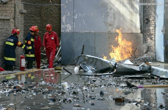 Fire fighters work at the blast site of a student dormitory at Lanzhou University in Lanzhou, capital of northwest China's Gansu Province, July 20, 2015. Seventeen people were injured after a gas blast rocked the 6-floor dorm building. (Photo: Xinhua/Deng Binshan) Fire fighters work at the blast site of a student dormitory at Lanzhou University in Lanzhou, capital of northwest China's Gansu Province, July 20, 2015. Seventeen people were injured after a gas blast rocked the 6-floor dorm building. (Photo: Xinhua/Deng Binshan)