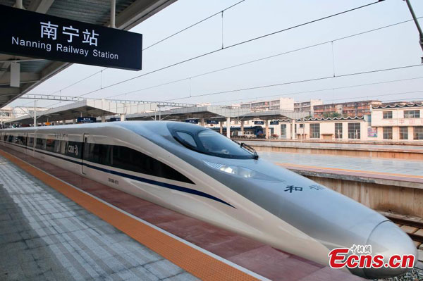 High-speed train G422, which travels to Beijing, is set to leave Nanning, South China's Guangxi Zhuang autonomous region, Sept 25, 2014. Starting operation on Sept 25, the train will cut the travel time between the two cities to 13 hours and 30 minutes. (Photo/China News Service) High-speed train G422, which travels to Beijing, is set to leave Nanning, South China's Guangxi Zhuang autonomous region, Sept 25, 2014. Starting operation on Sept 25, the train will cut the travel time between the two cities to 13 hours and 30 minutes. (Photo/China News Service)