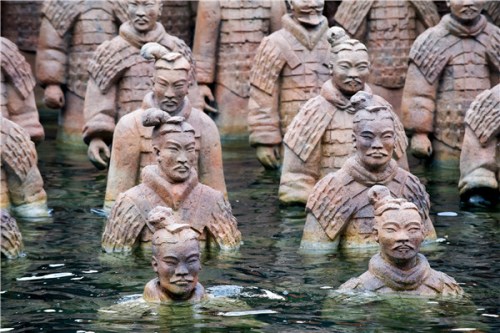 Terracotta Warrior figures rise out of the waters of Lake Constance at the Bregenz Festival's lake stage, where Giacomo Puccini's opera Turandot opened the monthlong celebration of the performing arts on Wednesday. The stage set featured a giant structure based on the Great Wall. (Photo by Qian Yi/Xinhua) Terracotta Warrior figures rise out of the waters of Lake Constance at the Bregenz Festival's lake stage, where Giacomo Puccini's opera Turandot opened the monthlong celebration of the performing arts on Wednesday. The stage set featured a giant structure based on the Great Wall. (Photo by Qian Yi/Xinhua)