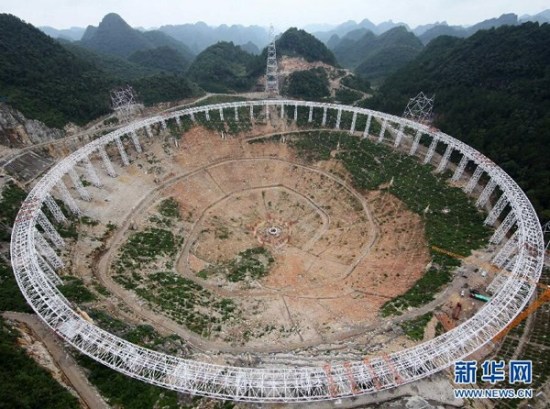 Photo taken on July 16 2014 shows the construction site of the world's largest radio telescope deep in the mountains of southwest China's Guizhou Province. (Photo/Xinhua) Photo taken on July 16 2014 shows the construction site of the world's largest radio telescope deep in the mountains of southwest China's Guizhou Province. (Photo/Xinhua)