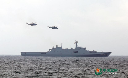 A landing ship division of the South China Sea Fleet, a marine brigade, a navy aviation unit, an amphibious armored force and other units jointly conduct a transportation drill in middle July 2015. (Photo/www.81.cn) A landing ship division of the South China Sea Fleet, a marine brigade, a navy aviation unit, an amphibious armored force and other units jointly conduct a transportation drill in middle July 2015. (Photo/www.81.cn)