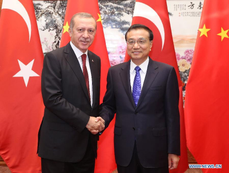 Chinese Premier Li Keqiang shakes hands with visiting Turkish President Recep Tayyip Erdogan in Beijing, China, July 29, 2015. (Photo: Xinhua/Pang Xinglei) Chinese Premier Li Keqiang shakes hands with visiting Turkish President Recep Tayyip Erdogan in Beijing, China, July 29, 2015. (Photo: Xinhua/Pang Xinglei)