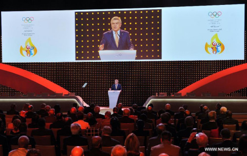 International Olympic Committee (IOC) President Thomas Bach speaks at the 128th IOC session in Kuala Lumpur, Malaysia, on July 31, 2015. The session will decide the host cities of the 2022 Olympic Winter Games and the 2020 Youth Olympic Winter Games. (Photo: Xinhua/Gong Lei) International Olympic Committee (IOC) President Thomas Bach speaks at the 128th IOC session in Kuala Lumpur, Malaysia, on July 31, 2015. The session will decide the host cities of the 2022 Olympic Winter Games and the 2020 Youth Olympic Winter Games. (Photo: Xinhua/Gong Lei)