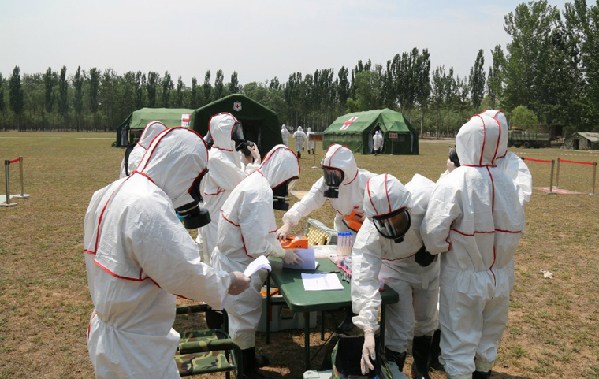 A nuclear emergency medical rescue drill codenamed "Medical Service Force – 2015C" is conducted at a training base of the PLA Academy of Military Medical Sciences (AMMS) in July 2015. A nuclear emergency medical rescue drill codenamed "Medical Service Force – 2015C" is conducted at a training base of the PLA Academy of Military Medical Sciences (AMMS) in July 2015.
