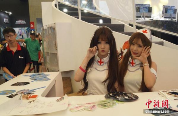 Models at Shanghai's annual digital entertainment expo ChinaJoy 2015, Aug. 2. (Photo/Chinanews.com) Models at Shanghai's annual digital entertainment expo ChinaJoy 2015, Aug. 2. (Photo/Chinanews.com)