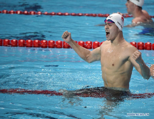 Sun Yang of China celebrates after winning the men's 400m freestyle swimming final at FINA World Championships in Kazan, Russia, Aug. 2, 2015. Sun Yang claimed the title of the event in a time of 3 minutes and 42.58 seconds. (Xinhua/Dai Tianfang) Sun Yang of China celebrates after winning the men's 400m freestyle swimming final at FINA World Championships in Kazan, Russia, Aug. 2, 2015. Sun Yang claimed the title of the event in a time of 3 minutes and 42.58 seconds. (Xinhua/Dai Tianfang)