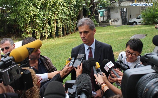 Dominique Sorain, La Reunion's administrator, talks to media after a press conference on search plan for MH370 debris in Reunion Island, on Aug. 7, 2015. Authority of France's oversea island La Reunion has confirmed the plan of search for more MH370 parts and said the search will last for at least one week. (Photo: Xinhua/Romain Latournerie) Dominique Sorain, La Reunion's administrator, talks to media after a press conference on search plan for MH370 debris in Reunion Island, on Aug. 7, 2015. Authority of France's oversea island La Reunion has confirmed the plan of search for more MH370 parts and said the search will last for at least one week. (Photo: Xinhua/Romain Latournerie)