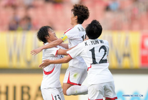 Players of the Democratic People's Republic of Korea (DPRK) celebrate victory after the match against South Korea at the 2015 EAFF(East Asian Football Federation) Women's East Asian Cup in Wuhan, capital of central China's Hubei Province, Aug. 8, 2015. DPRK won 2-0 and claimed the title of 2015 EAEF Women's East Asian Cup. (Xinhua/Cheng Min) Players of the Democratic People's Republic of Korea (DPRK) celebrate victory after the match against South Korea at the 2015 EAFF(East Asian Football Federation) Women's East Asian Cup in Wuhan, capital of central China's Hubei Province, Aug. 8, 2015. DPRK won 2-0 and claimed the title of 2015 EAEF Women's East Asian Cup. (Xinhua/Cheng Min)