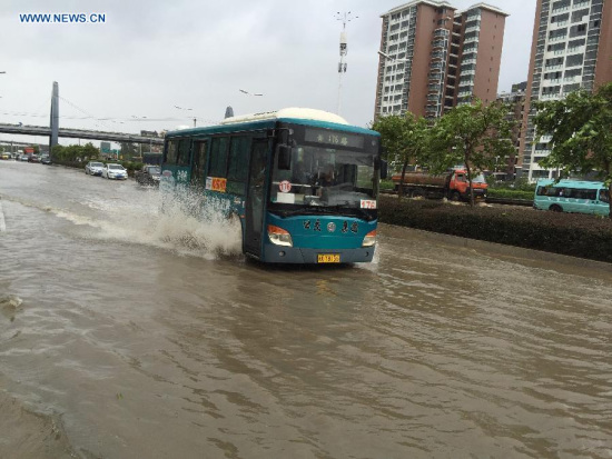A bus runs on a waterlogged road in downtown Fuzhou, capital of southeast China's Fujian Province, Aug. 9, 2015. Typhoon Soudelor stormed through Fujian after it landed in the province on Saturday night, causing urban waterlogging in the capital city of Fuzhou. (Photo: Xinhua/Jiang Kehong) A bus runs on a waterlogged road in downtown Fuzhou, capital of southeast China's Fujian Province, Aug. 9, 2015. Typhoon Soudelor stormed through Fujian after it landed in the province on Saturday night, causing urban waterlogging in the capital city of Fuzhou. (Photo: Xinhua/Jiang Kehong)