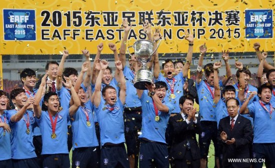 Players of South Korea celebrate with the trophy at the 2015 EAFF(East Asian Football Federation) East Asian Cup in Wuhan, capital of central China's Hubei Province, Aug. 9, 2015. (Photo: Xinhua/Cheng Min) Players of South Korea celebrate with the trophy at the 2015 EAFF(East Asian Football Federation) East Asian Cup in Wuhan, capital of central China's Hubei Province, Aug. 9, 2015. (Photo: Xinhua/Cheng Min)