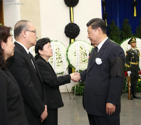 Chinese President Xi Jinping (R, front) shakes hands with a family member of Wei Jianxing, former head of China's top anti-graft body the Central Commission for Discipline Inspection of the Communist Party of China, during Wei's funeral at Babaoshan Revolutionary Cemetery in Beijing, capital of China, Aug. 16, 2015. (Photo: Xinhua/Liu Weibing) Chinese President Xi Jinping (R, front) shakes hands with a family member of Wei Jianxing, former head of China's top anti-graft body the Central Commission for Discipline Inspection of the Communist Party of China, during Wei's funeral at Babaoshan Revolutionary Cemetery in Beijing, capital of China, Aug. 16, 2015. (Photo: Xinhua/Liu Weibing)