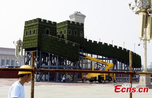 Frames are set to prepare for the flower decoration at the Tiananmen Square in Beijing, capital of China, Aug. 12, 2015. (CNS photo/ Lihuisi) Frames are set to prepare for the flower decoration at the Tiananmen Square in Beijing, capital of China, Aug. 12, 2015. (CNS photo/ Lihuisi)