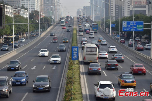 Beijing’s main roads have seen an apparent drop in traffic during the morning rush hour on Aug 20, 2015, the first day of a traffic ban aimed to ease traffic during the IAAF World athletics championships and the World War II victory parade. (Photo: China News Service /Jin Shuo) Beijing’s main roads have seen an apparent drop in traffic during the morning rush hour on Aug 20, 2015, the first day of a traffic ban aimed to ease traffic during the IAAF World athletics championships and the World War II victory parade. (Photo: China News Service /Jin Shuo)