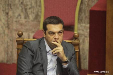 File photo taken on Aug. 14, 2015 shows Greek Prime Minister Alexis Tsipras reacting in the parliament in Athens, capital of Greece. File photo taken on Aug. 14, 2015 shows Greek Prime Minister Alexis Tsipras reacting in the parliament in Athens, capital of Greece.