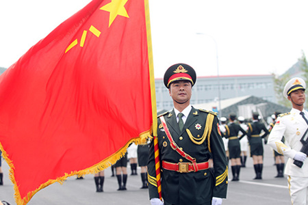Flag bearer Zhang Hongjie will take part in the Sept 3 grand parade. (Photo: China Daily/Zhou Hong) Flag bearer Zhang Hongjie will take part in the Sept 3 grand parade. (Photo: China Daily/Zhou Hong)