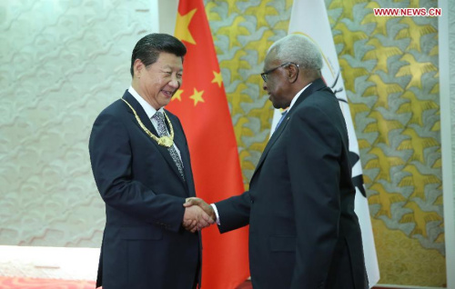 Chinese President Xi Jinping(L) receives the IAAF Golden Order of Merit from IAAF President Lamine Diack, in Beijing, capital of China, Aug. 22, 2015. (Xinhua/Lan Hongguang) Chinese President Xi Jinping(L) receives the IAAF Golden Order of Merit from IAAF President Lamine Diack, in Beijing, capital of China, Aug. 22, 2015. (Xinhua/Lan Hongguang)