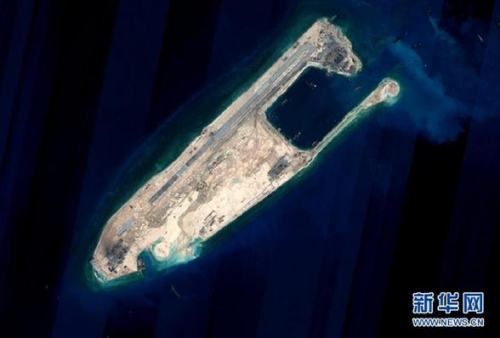This satellite image released on Wednesday shows the Fiery Cross Reef where the reclamation project has been completed. (Photo/Xinhua) This satellite image released on Wednesday shows the Fiery Cross Reef where the reclamation project has been completed. (Photo/Xinhua)
