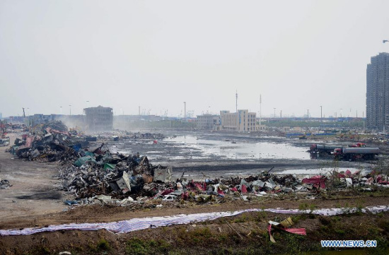 Debris near the core area of explosion site is cleared up in Tianjin, north China, Aug. 25, 2015. The death toll from the Tianjin warehouse explosions rises to 135 as of Tuesday afternoon, according to the latest data from rescue authorities. (Photo: Xinhua/Zhang Chenlin) Debris near the core area of explosion site is cleared up in Tianjin, north China, Aug. 25, 2015. The death toll from the Tianjin warehouse explosions rises to 135 as of Tuesday afternoon, according to the latest data from rescue authorities. (Photo: Xinhua/Zhang Chenlin)