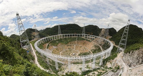 An overview of the 500-meter aperture spherical radio telescope. Still being built, it will be the world's largest radio telescope after it is completed in September 2016. (Zeng Jun/China Daily) An overview of the 500-meter aperture spherical radio telescope. Still being built, it will be the world's largest radio telescope after it is completed in September 2016. (Zeng Jun/China Daily)