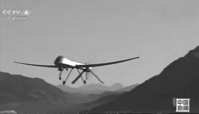 China's largest self-developed unmanned combat aerial vehicle, or combat drone, makes its first flight in Gansu Province in northwest China. (Photo/CCTV) China's largest self-developed unmanned combat aerial vehicle, or combat drone, makes its first flight in Gansu Province in northwest China. (Photo/CCTV)