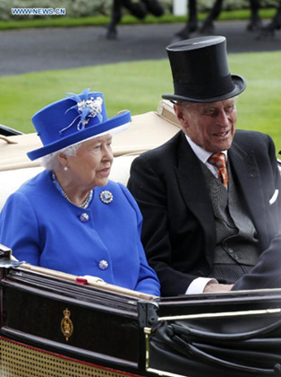 Queen Elizabeth II(L) and her husband Prince Philip the Duke of Edinburgh arrive in the royal carriage for day 2 of Royal Ascot at Ascot Racecourse in Ascot, Great Britain, on June 17, 2015. (Photo: Xinhua/Han Yan) Queen Elizabeth II(L) and her husband Prince Philip the Duke of Edinburgh arrive in the royal carriage for day 2 of Royal Ascot at Ascot Racecourse in Ascot, Great Britain, on June 17, 2015. (Photo: Xinhua/Han Yan)
