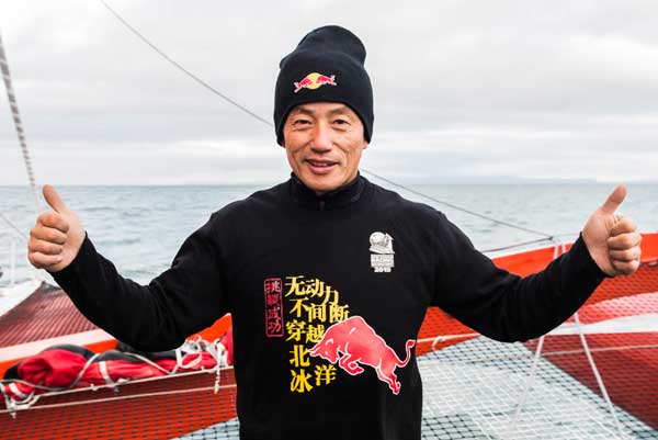 Chinese skipper Guo Chuan celebrates onboard the Qingdao China after finishing a nonstop voyage through the Arctic Ocean. (Photo provided to chinadaily.com.cn) Chinese skipper Guo Chuan celebrates onboard the Qingdao China after finishing a nonstop voyage through the Arctic Ocean. (Photo provided to chinadaily.com.cn)