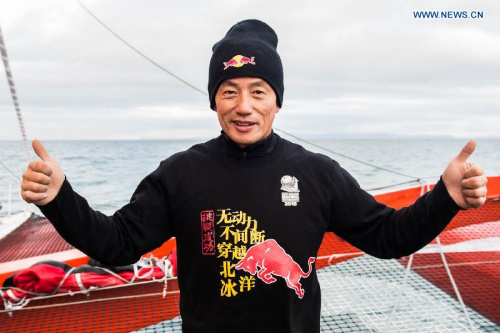 Chinese skipper Guo Chuan poses for photo after finally crossing the finish line on the Bering Strait at 16.48 UTC on September 15. (Photo/Xinhua) Chinese skipper Guo Chuan poses for photo after finally crossing the finish line on the Bering Strait at 16.48 UTC on September 15. (Photo/Xinhua)