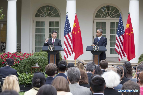 Chinese President Xi Jinping (L) and U.S. President Barack Obama meet with the press after their talks in Washington D.C., the United States, Sept. 25, 2015. (Photo: Xinhua/Huang Jingwen) Chinese President Xi Jinping (L) and U.S. President Barack Obama meet with the press after their talks in Washington D.C., the United States, Sept. 25, 2015. (Photo: Xinhua/Huang Jingwen)