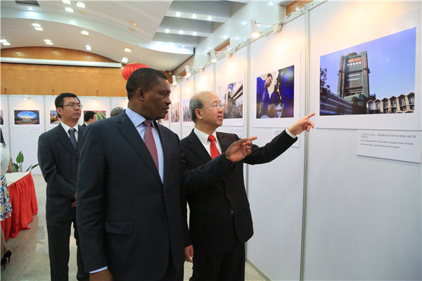 Chinese Ambassador Liu Xianfa (right) explains a picture to Justin Muturi, the speaker of Kenya's National Assembly. at a photo exhibition that was held at the same time as the reception for the 66th anniversary of the founding of the People's Republic of China. Hou Liqiang / China Daily Chinese Ambassador Liu Xianfa (right) explains a picture to Justin Muturi, the speaker of Kenya's National Assembly. at a photo exhibition that was held at the same time as the reception for the 66th anniversary of the founding of the People's Republic of China. Hou Liqiang / China Daily