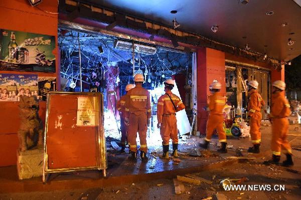 Firemen enter a blast site in Liucheng County, south China's Guangxi Zhuang Autonomous Region, on Sept. 30, 2015. The death toll from 17 suspected letter bombs in Liucheng on Wednesday afternoon has risen to seven, with two missing and another 51 injured. The explosions occurred at the seat of Liucheng county and the surrounding areas, including a shopping mall and the dorm of a local animal husbandry bureau, with the first heard at about 3:15 p.m.. Police have identified a 33-year-old man named Wei, a native of Liucheng county, as a suspect. (Xinhua/Zhang Ailin) Firemen enter a blast site in Liucheng County, south China's Guangxi Zhuang Autonomous Region, on Sept. 30, 2015. The death toll from 17 suspected letter bombs in Liucheng on Wednesday afternoon has risen to seven, with two missing and another 51 injured. The explosions occurred at the seat of Liucheng county and the surrounding areas, including a shopping mall and the dorm of a local animal husbandry bureau, with the first heard at about 3:15 p.m.. Police have identified a 33-year-old man named Wei, a native of Liucheng county, as a suspect. (Xinhua/Zhang Ailin)