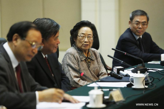 Tu Youyou (2nd R) speaks during a seminar celebrating her winning the 2015 Nobel Prize for Physiology or Medicine in Beijing, capital of China, Oct. 8, 2015. (Xinhua/Shen Bohan) Tu Youyou (2nd R) speaks during a seminar celebrating her winning the 2015 Nobel Prize for Physiology or Medicine in Beijing, capital of China, Oct. 8, 2015. (Xinhua/Shen Bohan)