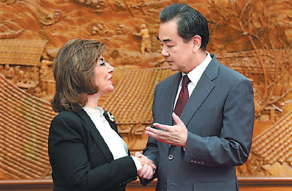 Foreign Minister Wang Yi meets on Monday with Bouthania Shaaban, the Syrian president's adviser for political and media affairs. (Photo: China Daily/Feng Yongbin) Foreign Minister Wang Yi meets on Monday with Bouthania Shaaban, the Syrian president's adviser for political and media affairs. (Photo: China Daily/Feng Yongbin)