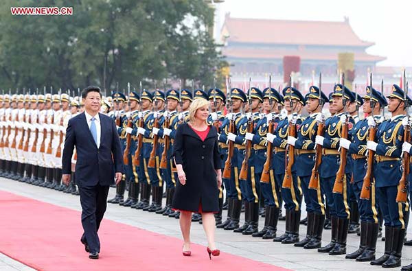 Chinese President Xi Jinping (L) holds a welcoming ceremony for Croatia's President Kolinda Grabar-Kitarovic before their talks in Beijing, Oct 14, 2015. (Photo/Xinhua) Chinese President Xi Jinping (L) holds a welcoming ceremony for Croatia's President Kolinda Grabar-Kitarovic before their talks in Beijing, Oct 14, 2015. (Photo/Xinhua)