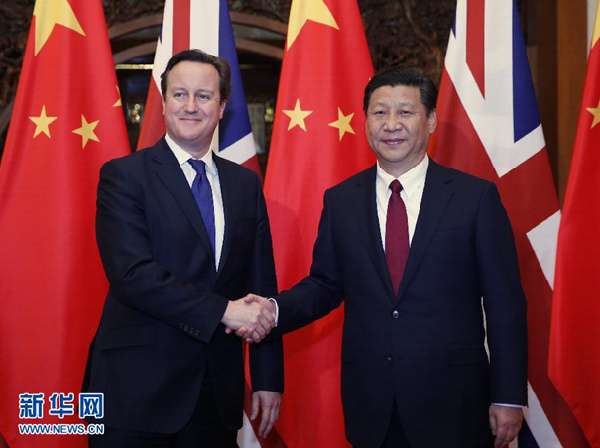 President Xi Jinping meets with UK Prime Minister David Cameron in Beijing, Dec 2, 2013. (Photo/Xinhua) President Xi Jinping meets with UK Prime Minister David Cameron in Beijing, Dec 2, 2013. (Photo/Xinhua)