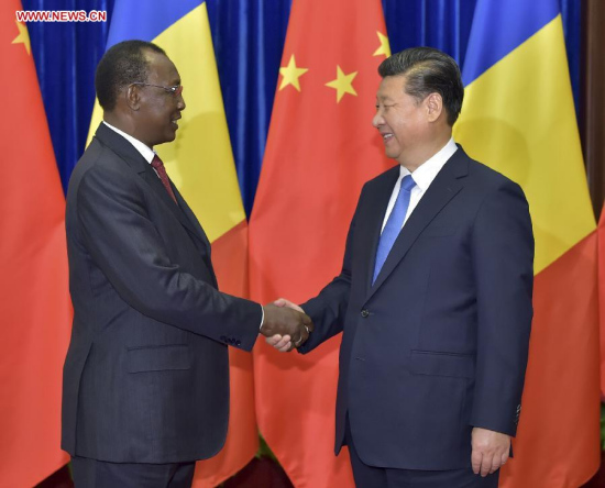 Chinese President Xi Jinping shakes hands with Chadian President Idriss Deby at the Great Hall of the People in Beijing, China, Oct. 15, 2015. (Photo: Xinhua/Li Tao) Chinese President Xi Jinping shakes hands with Chadian President Idriss Deby at the Great Hall of the People in Beijing, China, Oct. 15, 2015. (Photo: Xinhua/Li Tao)