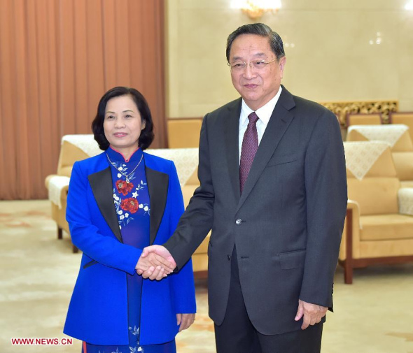 Yu Zhengsheng (R), chairman of the National Committee of the Chinese People's Political Consultative Conference (CPPCC), meets with Vice President of the Vietnam Fatherland Front (VFF) Central Committee Bui Thi Thanh in Beijing, capital of China, Oct. 20, 2015. (Photo: Xinhua/Li Tao) Yu Zhengsheng (R), chairman of the National Committee of the Chinese People's Political Consultative Conference (CPPCC), meets with Vice President of the Vietnam Fatherland Front (VFF) Central Committee Bui Thi Thanh in Beijing, capital of China, Oct. 20, 2015. (Photo: Xinhua/Li Tao)