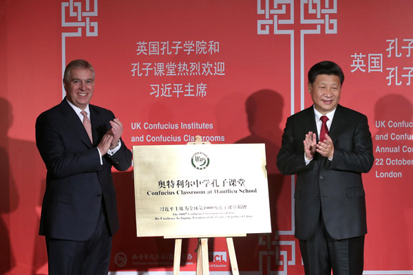 China's President Xi Jinping (R) applauds with Britain's Prince Andrew after unveiling a plaque during a Confucius event at the Mandarin Oriental hotel in London, Britain Oct 22, 2015.(Photo/Xinhua) China's President Xi Jinping (R) applauds with Britain's Prince Andrew after unveiling a plaque during a Confucius event at the Mandarin Oriental hotel in London, Britain Oct 22, 2015.(Photo/Xinhua)