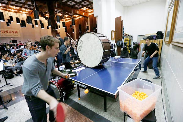 Table tennis players share the stage with musicians in the PingPong Concerto in Beijing. Jiang Dong / China Daily Table tennis players share the stage with musicians in the PingPong Concerto in Beijing. Jiang Dong / China Daily