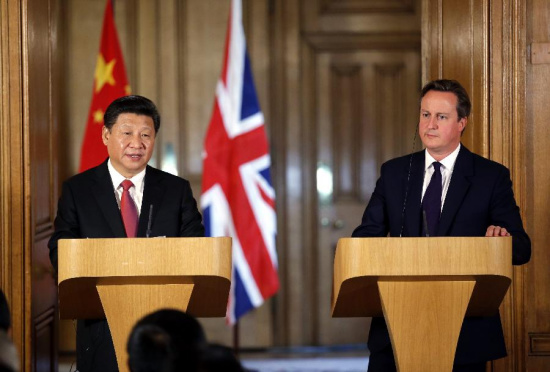 Chinese President Xi Jinping (L) and British Prime Minister David Cameron meet media after their talks at 10 Downing Street in London, Britain, Oct. 21, 2015. (Photo: Xinhua/Ju Peng) Chinese President Xi Jinping (L) and British Prime Minister David Cameron meet media after their talks at 10 Downing Street in London, Britain, Oct. 21, 2015. (Photo: Xinhua/Ju Peng)