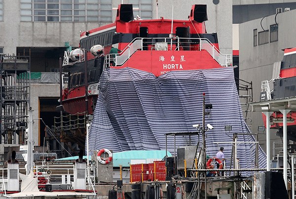 The ferry involved in Sunday night's accident has been towed to the Cheung Sha Wan dock for inspection. More than 30 people remained hospitalized on Monday following the accident near Lantau.(Photo: China Daily/Edmond Tang) The ferry involved in Sunday night's accident has been towed to the Cheung Sha Wan dock for inspection. More than 30 people remained hospitalized on Monday following the accident near Lantau.(Photo: China Daily/Edmond Tang)