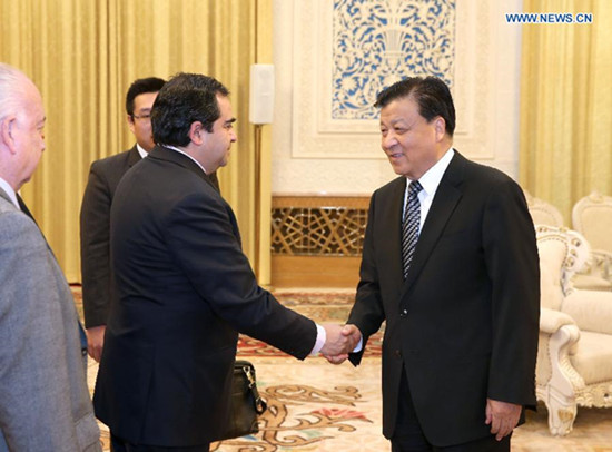 Liu Yunshan (R), a member of the Standing Committee of the Political Bureau of the Communist Party of China (CPC) Central Committee, meets with a visiting delegation of cadres of Chile's ruling coalition, in Beijing, capital of China, Oct. 30, 2015. (Xinhua/Pang Xinglei) Liu Yunshan (R), a member of the Standing Committee of the Political Bureau of the Communist Party of China (CPC) Central Committee, meets with a visiting delegation of cadres of Chile's ruling coalition, in Beijing, capital of China, Oct. 30, 2015. (Xinhua/Pang Xinglei)