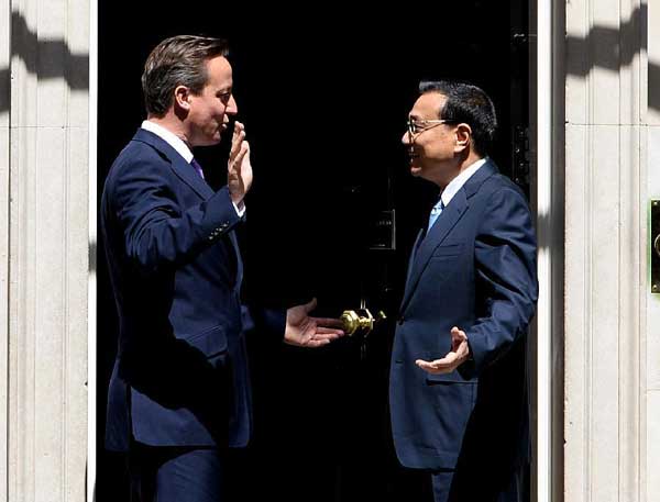 Premier Li Keqiang holds a meeting with British Prime Minister David Cameron in London, June 17, 2014. (Photo/Xinhua) Premier Li Keqiang holds a meeting with British Prime Minister David Cameron in London, June 17, 2014. (Photo/Xinhua)