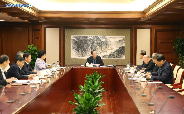 Yu Zhengsheng (back), chairman of the National Committee of the Chinese People's Political Consultative Conference (CPPCC) and also a member of the Standing Committee of the Political Bureau of the Communist Party of China (CPC) Central Committee, presides over a meeting of grasping the spirit highlighted at a key Communist Party of China (CPC) meeting and pooling wisdom for the nation's overall strategy for future development in Beijing, Oct. 30, 2015. (Photo: Xinhua/Yao Dawei) Yu Zhengsheng (back), chairman of the National Committee of the Chinese People's Political Consultative Conference (CPPCC) and also a member of the Standing Committee of the Political Bureau of the Communist Party of China (CPC) Central Committee, presides over a meeting of grasping the spirit highlighted at a key Communist Party of China (CPC) meeting and pooling wisdom for the nation's overall strategy for future development in Beijing, Oct. 30, 2015. (Photo: Xinhua/Yao Dawei)