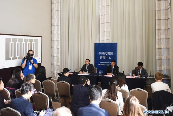 Chinese Vice Finance Minister Zhu Guangyao (C) speaks at a news conference in Antalya, Turkey, on Oct. 14, 2015. China has made significant contributions to the global economy through its own growth, Chinese Vice Finance Minister Zhu Guangyao told a news conference Tuesday on President Xi's Turkey trip. (Photo: Xinhua/He Canling)