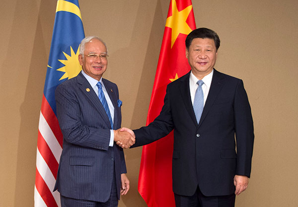 President Xi Jinping meets with Malaysian Prime Minister Najib Razak in Manila on Tuesday. XIE HUANCHI/XINHUA President Xi Jinping meets with Malaysian Prime Minister Najib Razak in Manila on Tuesday. XIE HUANCHI/XINHUA