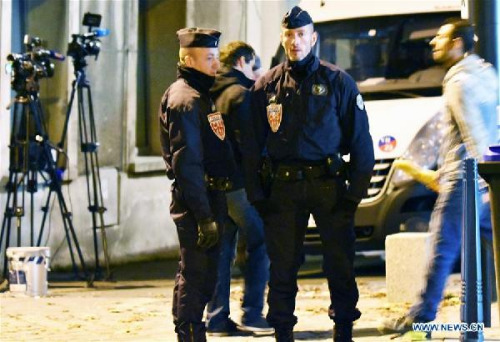 Policemen stands guard at a crossing in Saint-Denis, France, on Nov. 18. (Xinhua/Li Genxing) Policemen stands guard at a crossing in Saint-Denis, France, on Nov. 18. (Xinhua/Li Genxing)