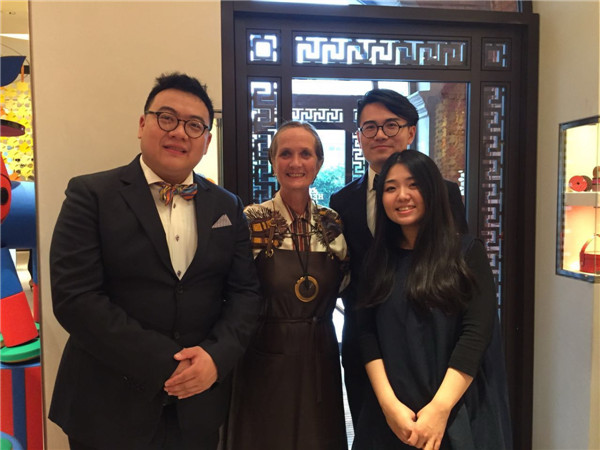 Pascale Mussard with three Chinese designers at the ongoing Shanghai Petit h exhibition. (Photo provided to China Daily) Pascale Mussard with three Chinese designers at the ongoing Shanghai Petit h exhibition. (Photo provided to China Daily)