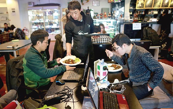 Young people at a cafe popular among start-up entrepreneurs in Zhongguancun, Beijing. Feng Yongbin / China Daily Young people at a cafe popular among start-up entrepreneurs in Zhongguancun, Beijing. Feng Yongbin / China Daily