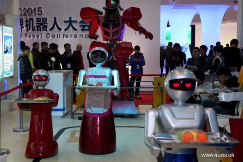 Robots that can serve as waiters are demonstrated during the World Robot Conference in Beijing, capital of China, Nov. 23, 2015. (Xinhua/Jin Liwang) Robots that can serve as waiters are demonstrated during the World Robot Conference in Beijing, capital of China, Nov. 23, 2015. (Xinhua/Jin Liwang)